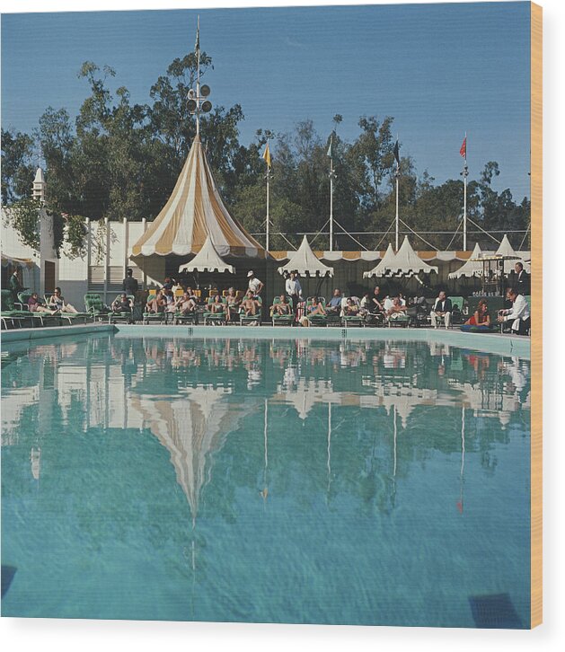 People Wood Print featuring the photograph Poolside Reflections by Slim Aarons