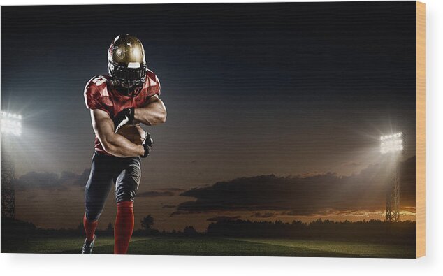 Soccer Uniform Wood Print featuring the photograph American Football In Action #1 by Dmytro Aksonov