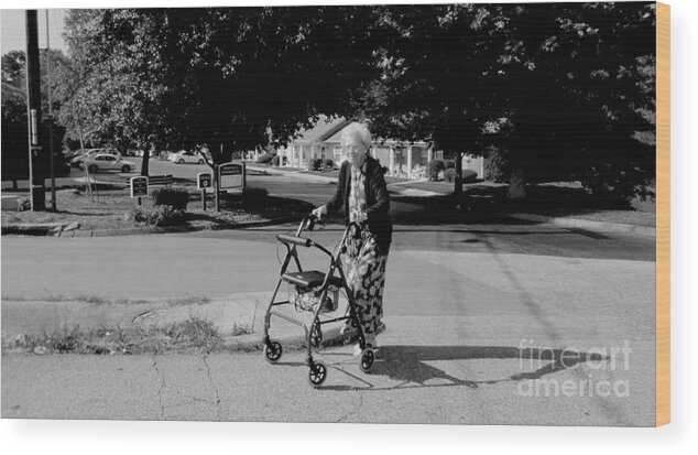 A Happy Elderly Woman Walking To The Grocery Store With Her Walker. Wood Print featuring the photograph Walker by Robert Loe