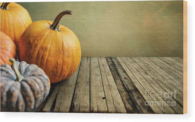 Thanksgiving Wood Print featuring the photograph Autumn pumpkins still life on vintage wooden table and rustic ba by Jelena Jovanovic