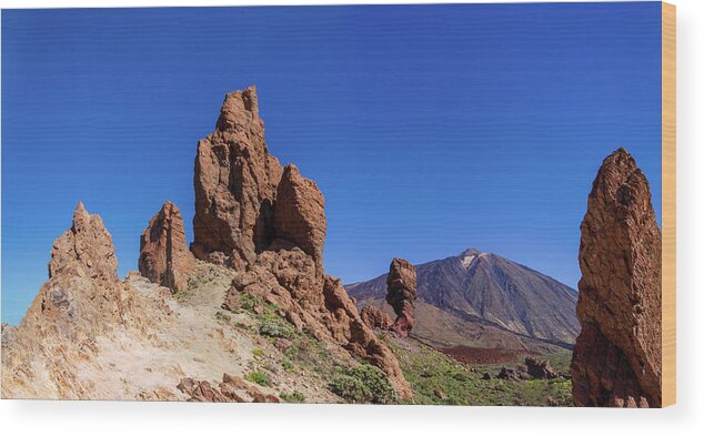 Mountains Wood Print featuring the photograph Red rocks in front of Mount Teide by Sun Travels