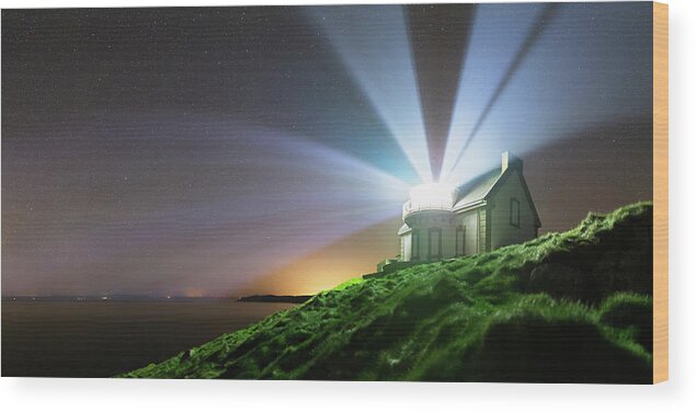 Phare Du Millier Wood Print featuring the photograph Lighthouse Beams At Night #1 by Laurent Laveder