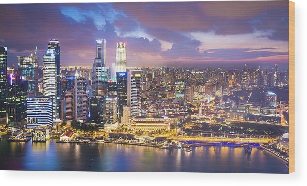 Downtown District Wood Print featuring the photograph Panoramic View Of Singapore At Dusk by Primeimages