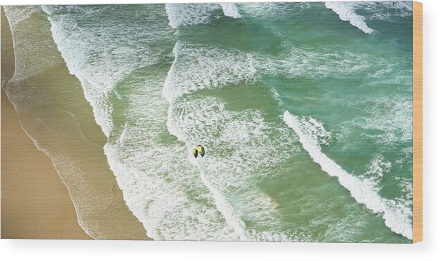Water's Edge Wood Print featuring the photograph Waves Rolling On To The Shore by © William Winkyi