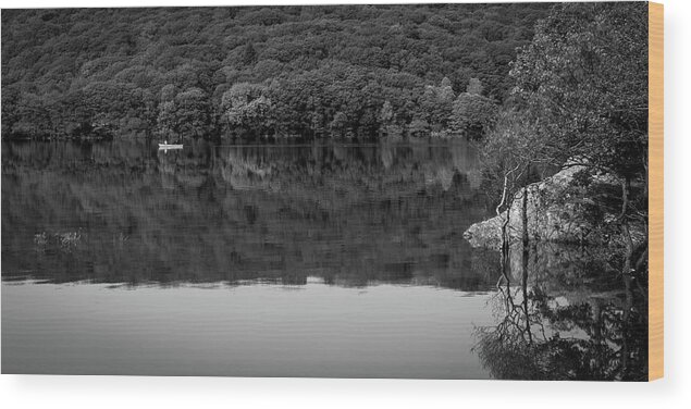 Britain Wood Print featuring the photograph A couple pass in a canoe on Coniston Water by Seeables Visual Arts