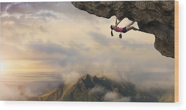 Scenics Wood Print featuring the photograph Woman Free Climber Climbs Overhang High Above Mountains at Dawn by Peepo