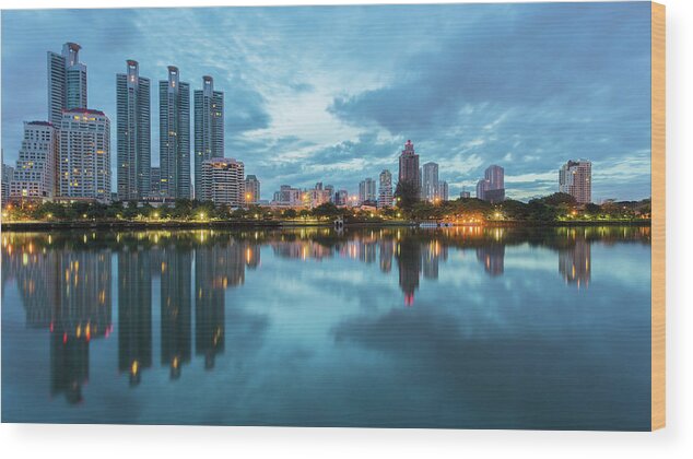 Tranquility Wood Print featuring the photograph Bangkok City Downtown With Reflection by Natthawat