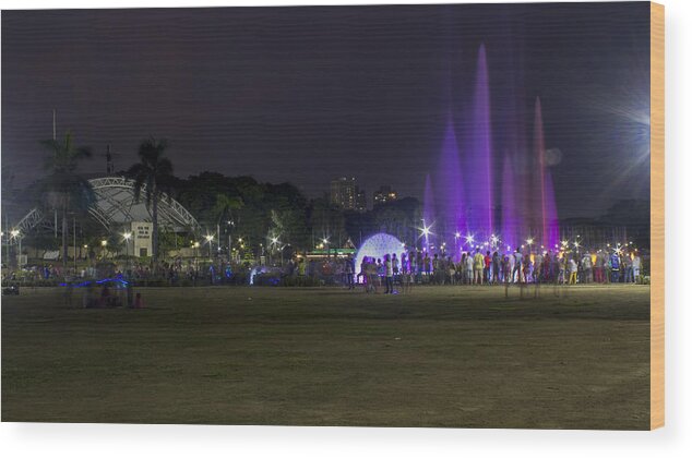 Outdoors Wood Print featuring the photograph People watching Musical Dancing Fountain at Rizal Park by Chris Dela Cruz