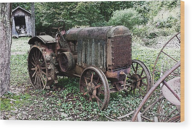 Rust Wood Print featuring the photograph Rusted Mc Cormick-Deering Tractor and Shed by Michael Spano
