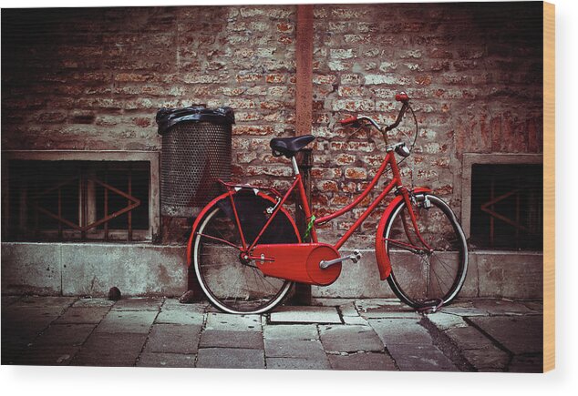 Damaged Wood Print featuring the photograph Vintage Bicycle Leaning Against Brick by Moreiso