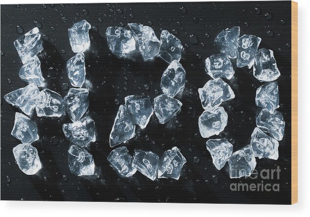 H2o Wood Print featuring the photograph H2O water symbol written in ice cubes and melting by Simon Bratt