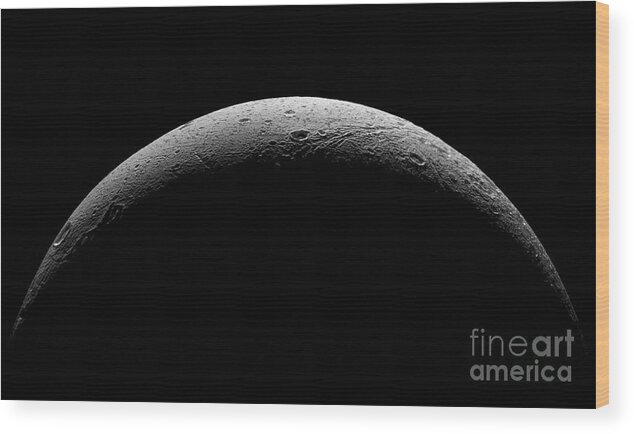 Astronomical Wood Print featuring the photograph Saturn's moon Dione by Nasa