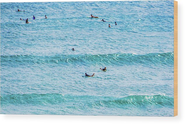 Surfers In The Pacific Ocean Wood Print featuring the photograph Surfers In The Ocean by Jera Sky