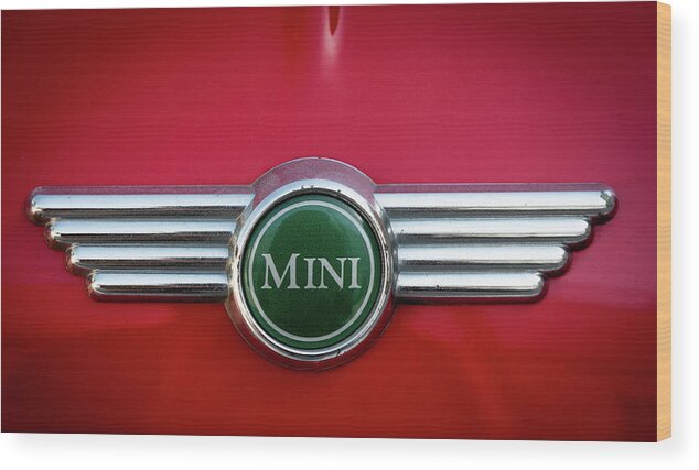 Mini Wood Print featuring the photograph Mini Cooper car logo on red surface #2 by Michalakis Ppalis