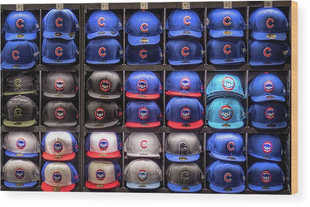 Cubs Caps Wood Print featuring the photograph Cap-tivating by Wes Iversen