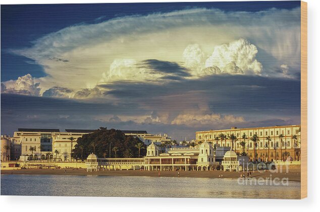 Famous Wood Print featuring the photograph Cloudy Sky over La Caleta Spa Cadiz by Pablo Avanzini