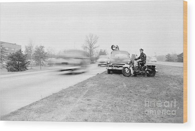 Hiding Wood Print featuring the photograph Motorcycle Police Officer Watching by Bettmann