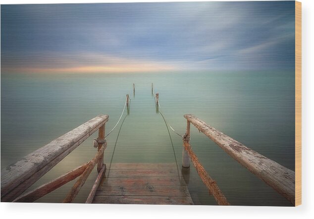 Cloud Sky Dawn Boardwalk Footbridge Day Good Material Landscape Scenery Scenics Nature Sea No People Outdoors Nature Water Pier Sunset Horizon Tranquil Scene Horizon Over Water Tranquility Beach Wood Print featuring the photograph Out To Sea by Bartolome Lopez