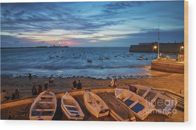 Sea Wood Print featuring the photograph People at Caleta Beach Photographing Sunset Dramatic Sky Cadiz Andalusia Spain by Pablo Avanzini