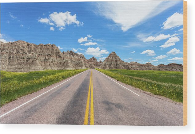 Badlands Wood Print featuring the photograph The road less traveled by Chris Spencer