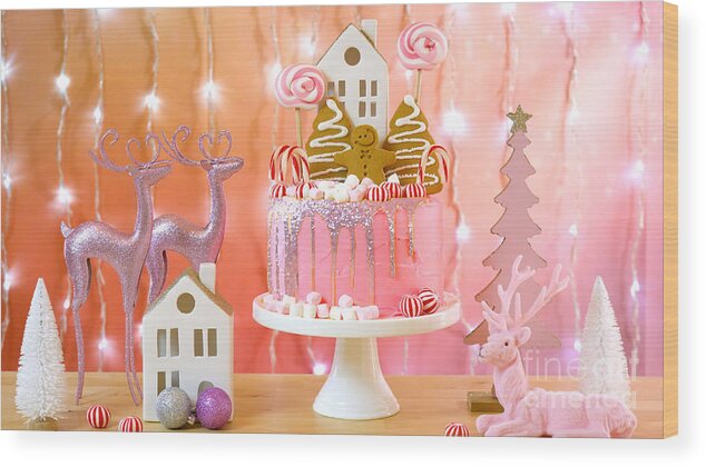 Christmas Wood Print featuring the photograph Candy land Christmas cake in pink and gold party table setting. #1 by Milleflore Images