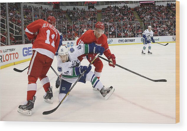 National Hockey League Wood Print featuring the photograph Vancouver Canucks v Detroit Red Wings #1 by Leon Halip
