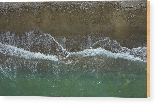 Waves Wood Print featuring the photograph Aerial view ocean waves braking on a sandy beach. Nature background by Michalakis Ppalis