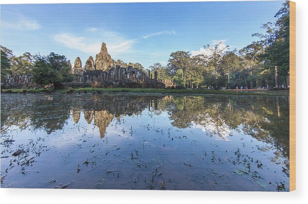 Reflection Wood Print featuring the photograph Angkor Wat temple by Stelios Kleanthous