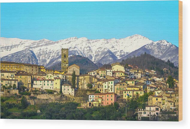 Coreglia Wood Print featuring the photograph Coreglia Antelminelli and Snowy Apennines by Stefano Orazzini