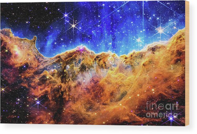 Astronomy Wood Print featuring the photograph Cosmic Cliffs in the Carinae Nebula in High Definition  by M G Whittingham