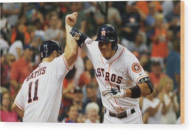 Evan Gattis Wood Print featuring the photograph Evan Gattis and Carlos Correa by Scott Halleran