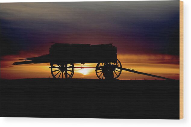 Wagon Wood Print featuring the photograph Last Load - wagon with load of lumber in silhouette with sunset by Peter Herman