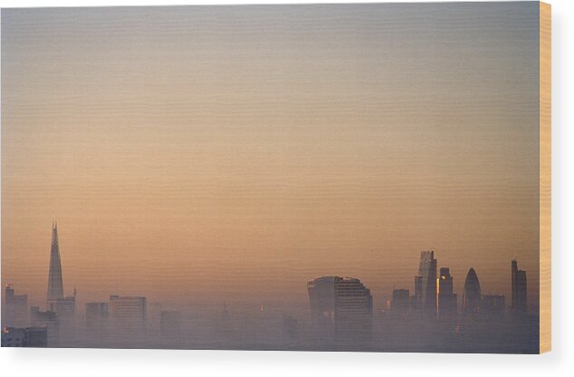Built Structure Wood Print featuring the photograph London city skyline on a foggy evening by Gary Yeowell