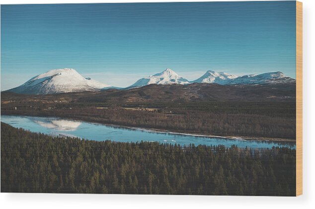 Touristic Wood Print featuring the photograph Malselva River with a reflection on the snow-covered hills by Vaclav Sonnek