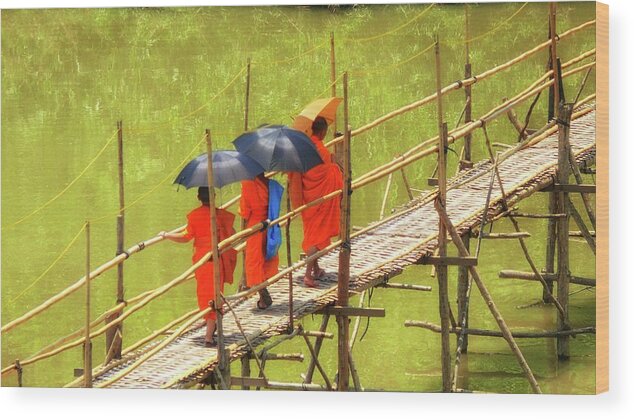 Luang Prabang Wood Print featuring the photograph Monks on the bridge by Robert Bociaga