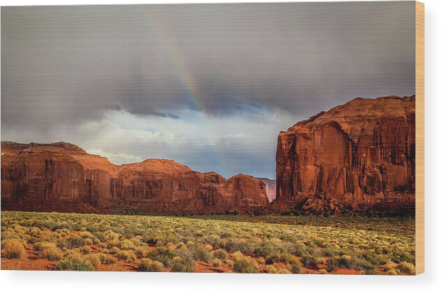 Monument Valley Wood Print featuring the photograph rainbow in Monument valley by Alberto Zanoni