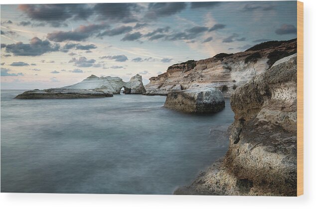 Coastline Wood Print featuring the photograph Rocky seashore seascape with wavy ocean and dramatic sunset by Michalakis Ppalis