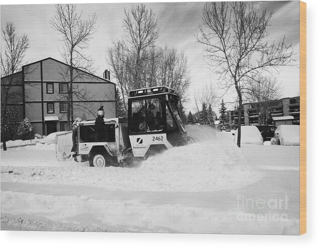 Downtown Wood Print featuring the photograph municipal city mini tractor clearing sidewalks and roads in Saskatoon Saskatchewan Canada #1 by Joe Fox