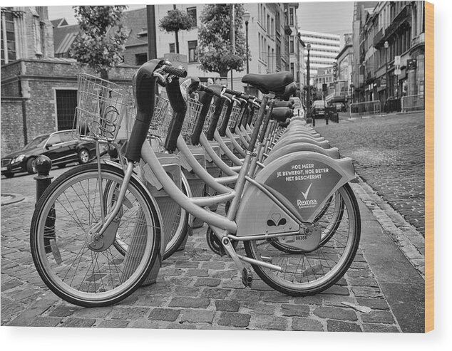 City Bicycles Wood Print featuring the photograph City Bicycles by Georgia Clare