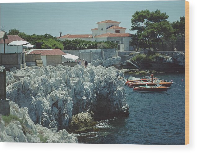 People Wood Print featuring the photograph Boats At Hotel Du Cap-eden-roc by Slim Aarons