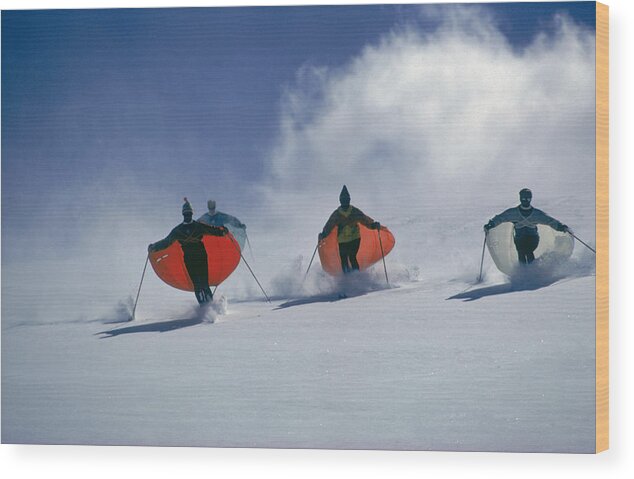 Skiing Wood Print featuring the photograph Caped Skiers by Slim Aarons