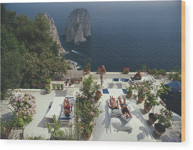 1980-1989 Wood Print featuring the photograph Il Canille by Slim Aarons