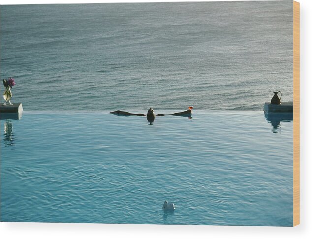 1980-1989 Wood Print featuring the photograph Mustique Pool by Slim Aarons