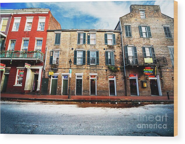 Bourbon Street Buildings Wood Print featuring the photograph Bourbon Street Buildings in New Orleans by John Rizzuto