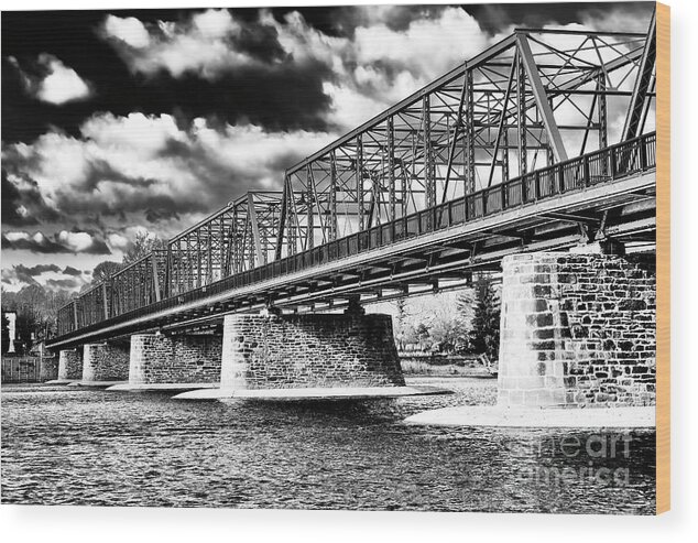Clouds Over The New Hope Lambertville Bridge Wood Print featuring the photograph Clouds Over the New Hope Lambertville Bridge by John Rizzuto
