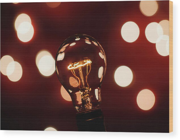 Light Bulb Wood Print featuring the photograph Light Bulb Bokeh by Gary Geddes