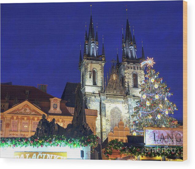 Christmas Star In Old Town Square Wood Print featuring the photograph Christmas Star in Old Town Square Prague by John Rizzuto