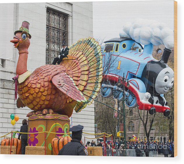 Macy's Thanksgiving Day Parade Wood Print featuring the photograph Tom Turkey Float and Thomas the Tank Engine Balloon at Macy's Thanksgiving Day Parade #1 by David Oppenheimer