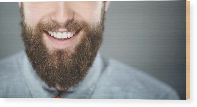 Handsome People Wood Print featuring the photograph Smiling bearded man. #1 by Gilaxia