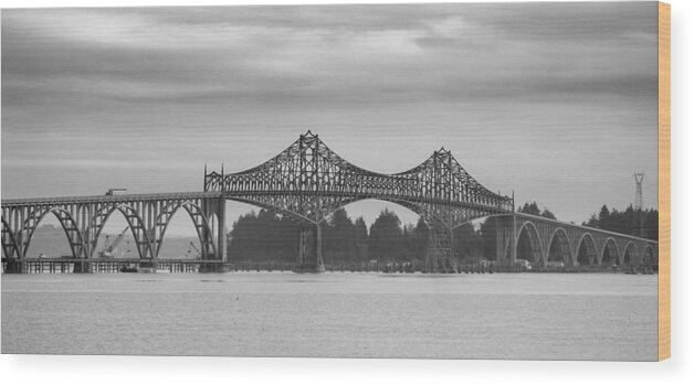 North Bend Bridge Oregon Coast Film Photograph Scenic Iconic Architecture Water Reflections Historical Landmark Steel Structure Spanning River Coastal Landscape Vintage Aesthetic Nostalgic Mood Black And White Analog Texture Rustic Charm Pacific Northwest Transportation Crossing Estuary Connection Maritime Backdrop Rugged Coastline Dramatic Sky Tones Atmospheric Engineering Marvel Travel Destination Artistic Capture Natural Beauty Connection River View Maritime Memorial Coos Wood Print featuring the photograph Bridge at North Bend by HW Kateley